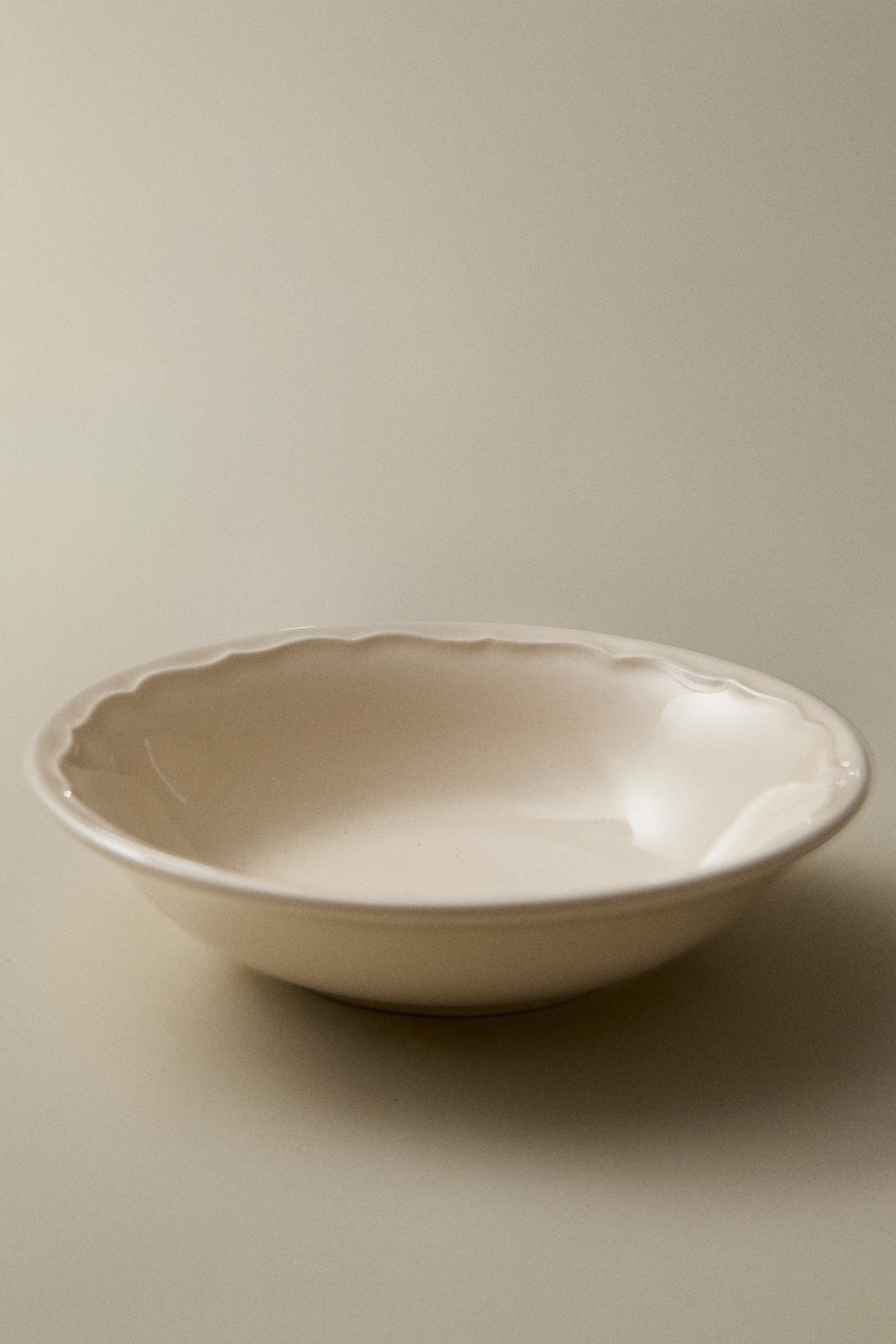 EARTHENWARE BOWL WITH RAISED-DESIGN EDGE